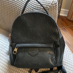 Knockoff LV mini backpack never used